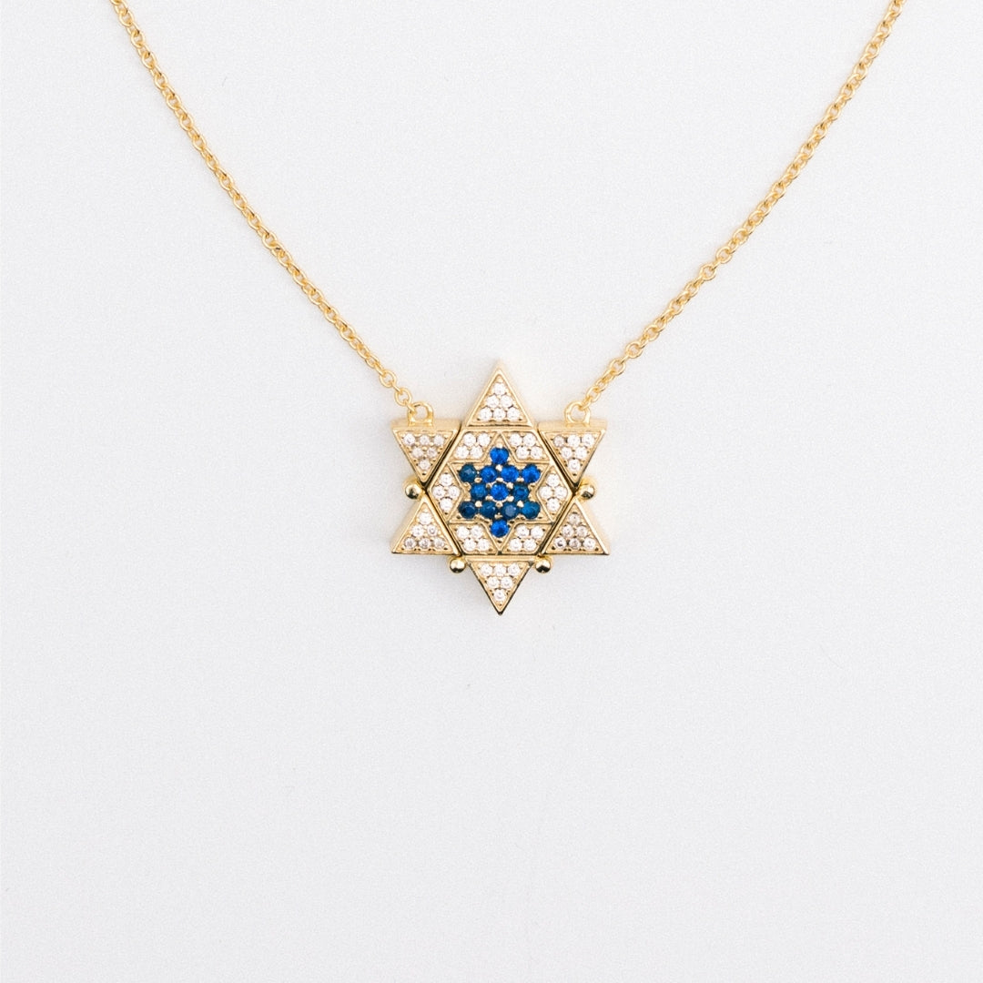 https://dyjudaica.com/cdn/shop/files/Spanish_Inq_Front_GOLD.jpg?v=1738516208